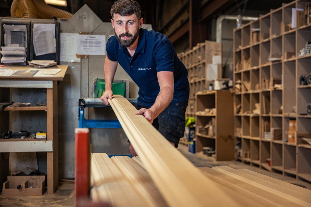 Promould team member at the moulding line
